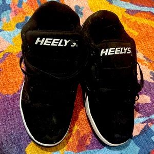 Heelys Voyager black and white heelys unisex size 7 youth 8 women’s